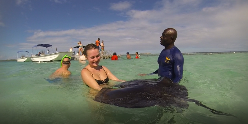 Charlotte meets a stingray in Antigua