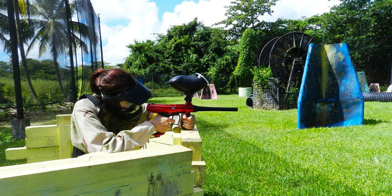 Person paintballing at Coconut Bay Beach Resort & Spa