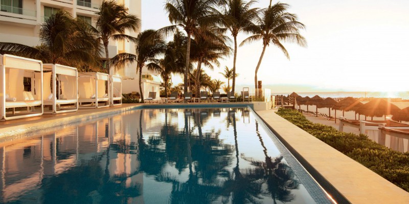 Reflect Cancun pool with Caribbean Warehouse