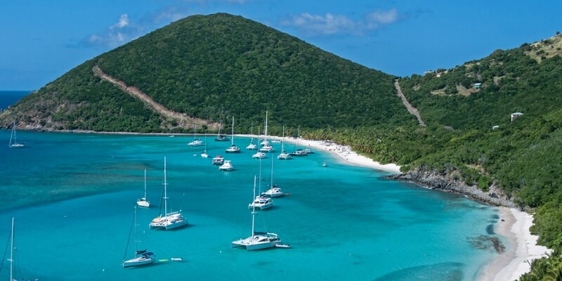 Aerial view of the green hills down to to the coast in British Virgin Islands