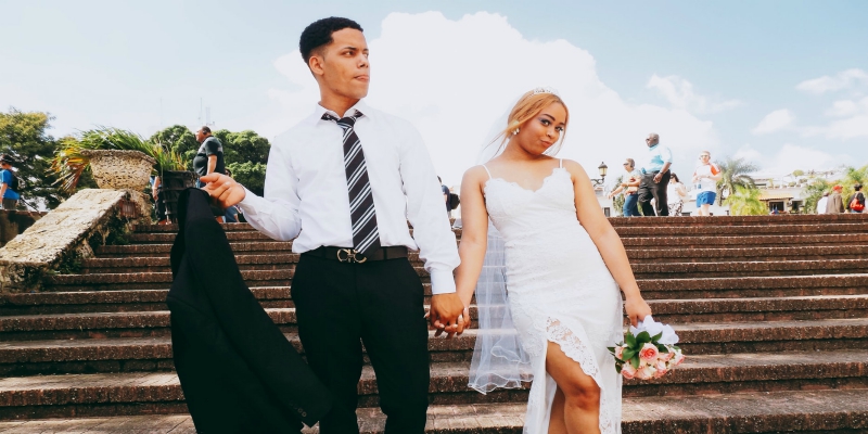 Groom posing with his new wife