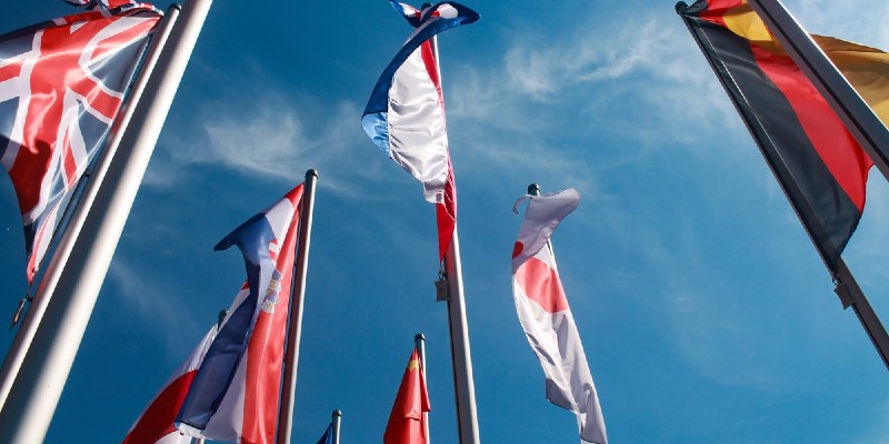 international flags flapping in the wind