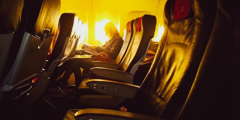 Woman sitting on a plane