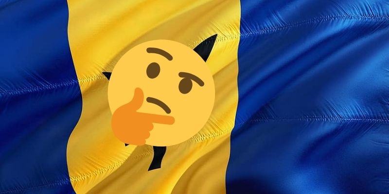 What symbol lies in the middle of the Barbados flag?