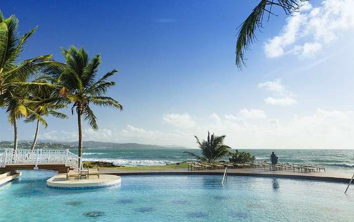 View over the Caribbean Sea from the pool at Magdalena Grand Beach & Golf Resort