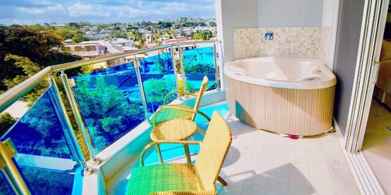 Luxury Ocean View Room featuring Private Balcony with a Jacuzzi