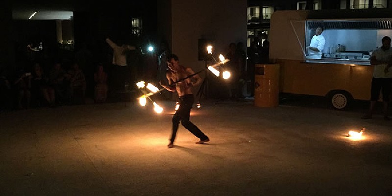 A fire dancer entertains the crowds