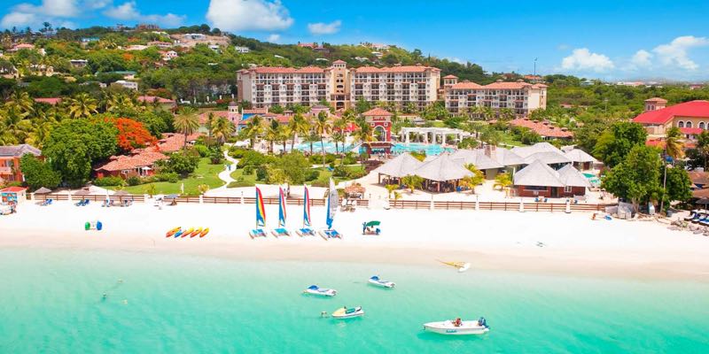 Aerial shot of the beachfront location where Sandals Grande Antigua Resort & Spa finds itself