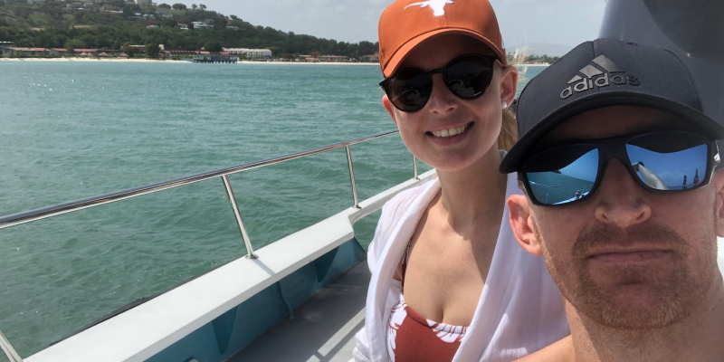 Cam and her partner on a boat