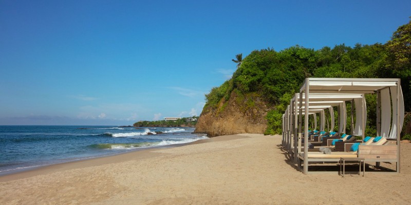 Stylish pagodas on the beach on the Bay of Banderas