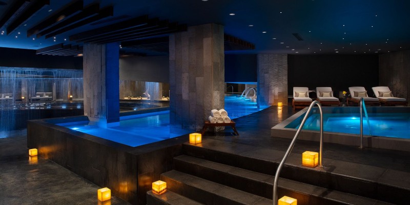 Inside the Spa by Pevonia at Secrets Bahia Mita, the spa's design is inspired by the natural cenotes of Mexico