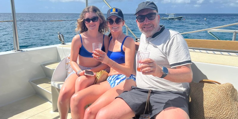 people relax on a catamaran in Barbados