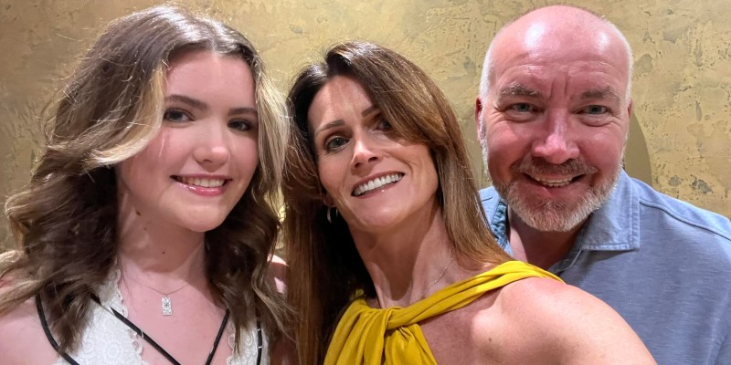 Family pose for a picture on holiday in Barbados