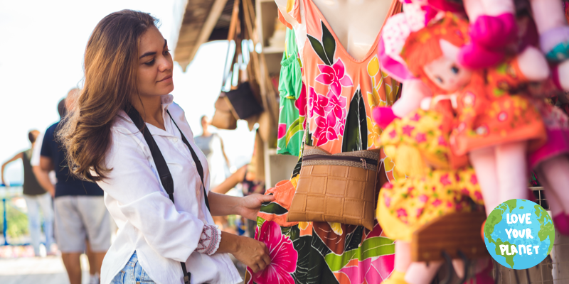 Woman shopping at a colourful market stall