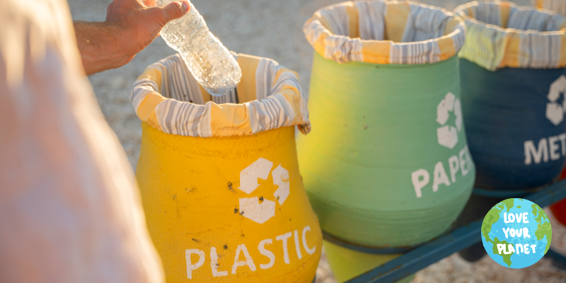eco-conscious travel - man recycling plastic