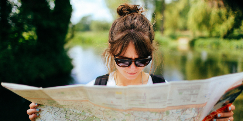 A girl reading a map