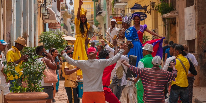 People dancing in the street in Cuba