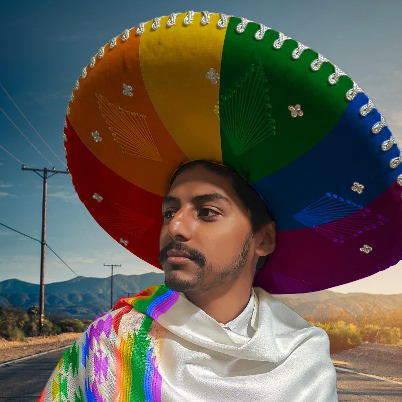 Person wearing a rainbow sombrero