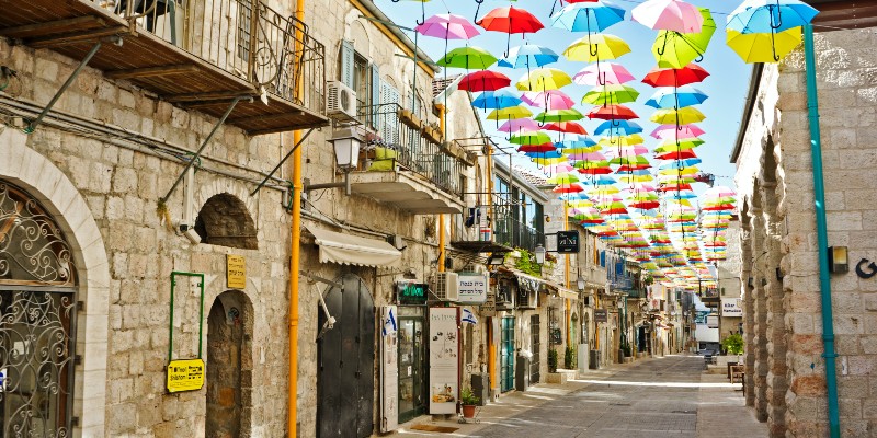 A street in Puerto Vallarta, Mexico where colourful umbrellas are hung overhead