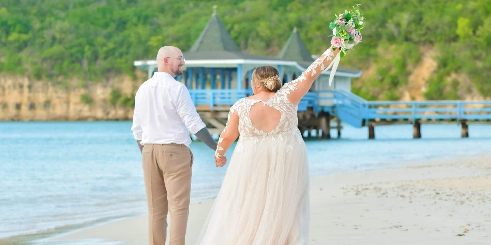 Jo and her new husband Jon are walking on the beach as Jo raises the bouquet into the air