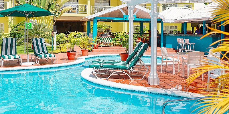 Sun loungers around the pool at Bay Gardens