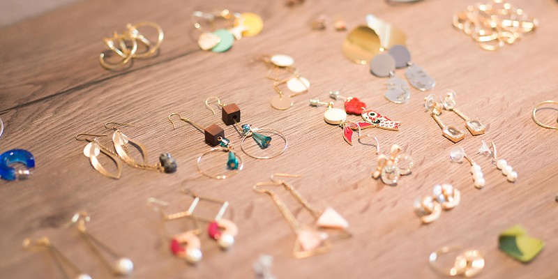 Earrings laid out on a table